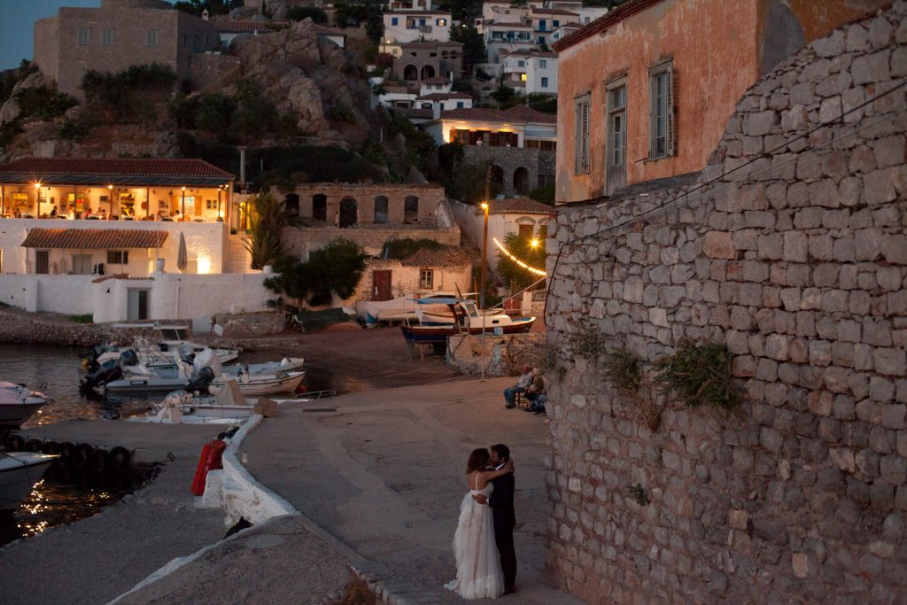 Couple silhouette twilight old fishing boat Aegean Sea Greece romantic coastal engagement photography Day One